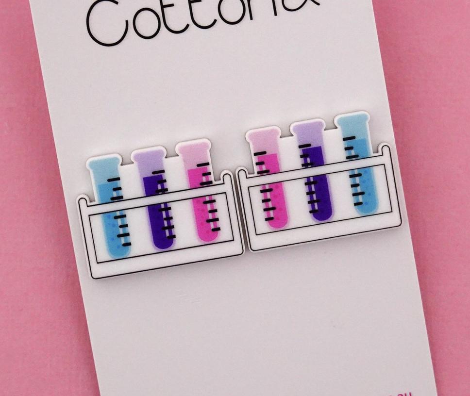 Studded earrings test tube