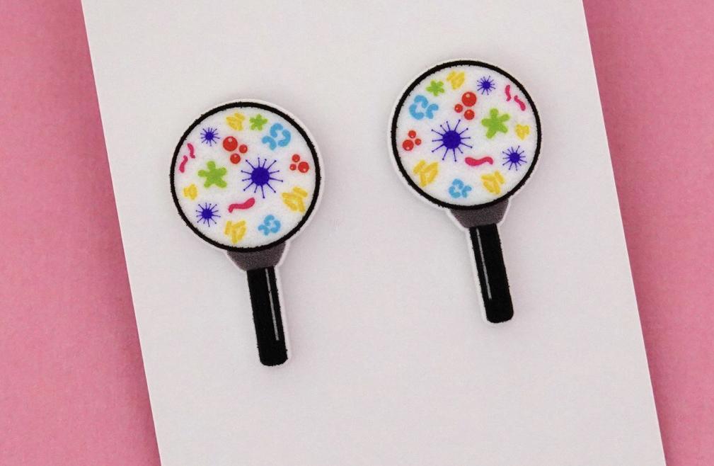 Stud earrings magnifying glass